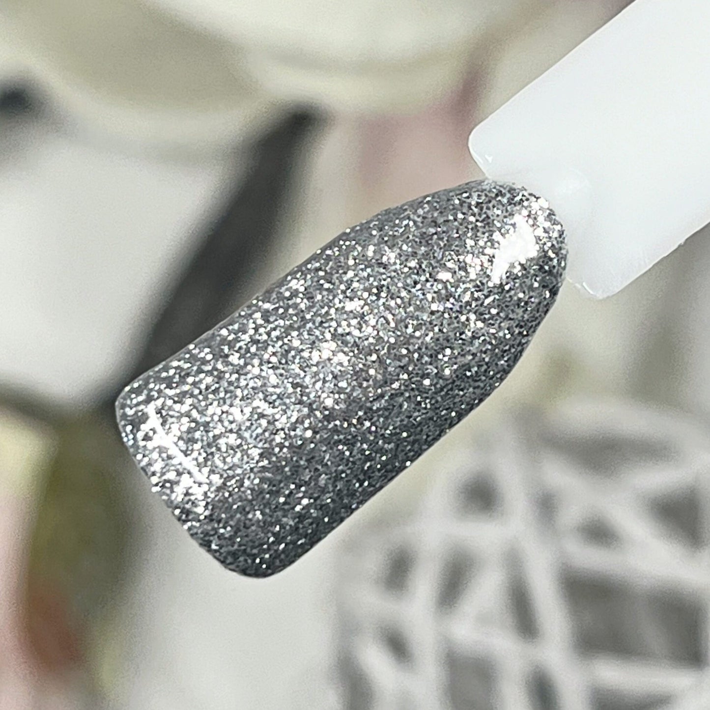 Winter Glam Farbgel Set von Nails Factory mit silbernem Glitter, ideal für festliche Nageldesigns und winterliche Looks.