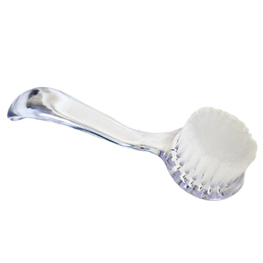 Klare Kosmetik- und Staubbürste von Nails Factory, handliche Bürste für Reinigung und Make-up-Anwendungen.